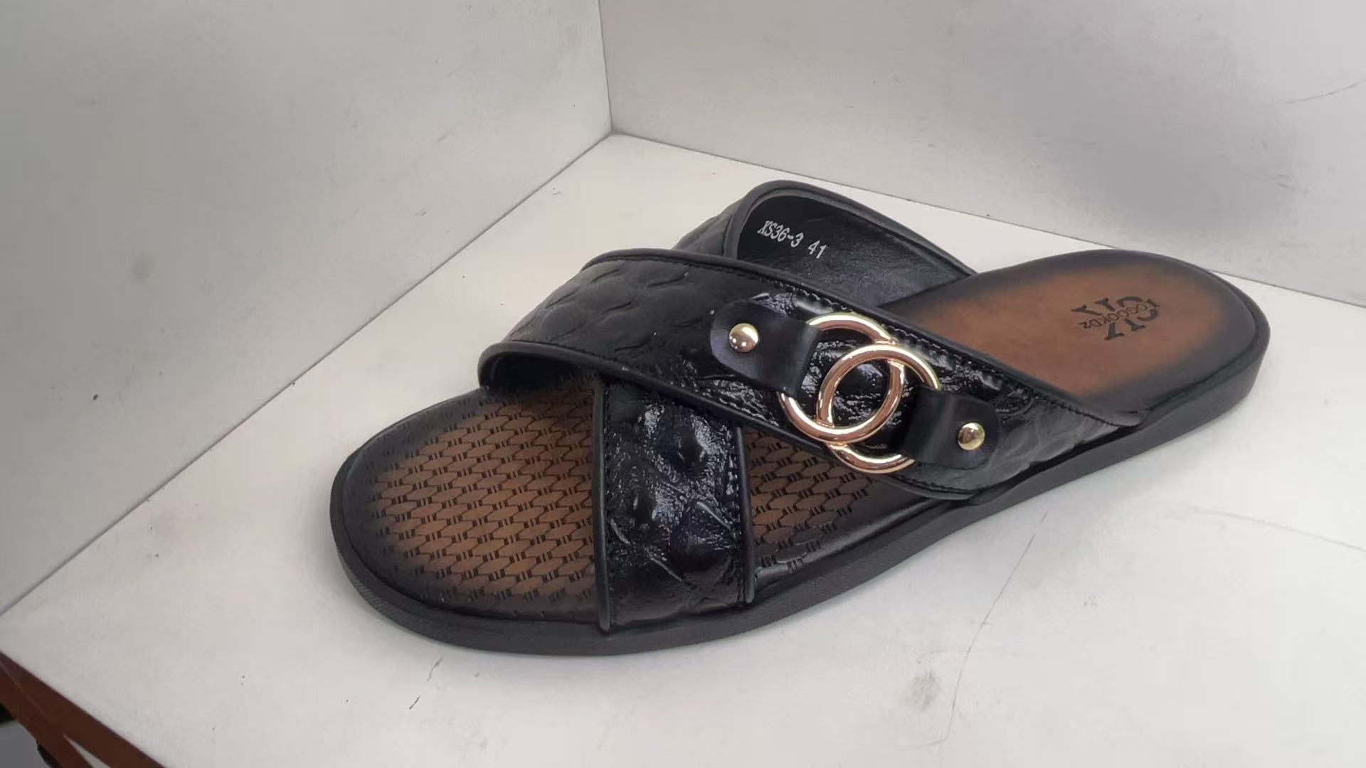 Black Cross-Strap Slides with Gold-Tone Rings